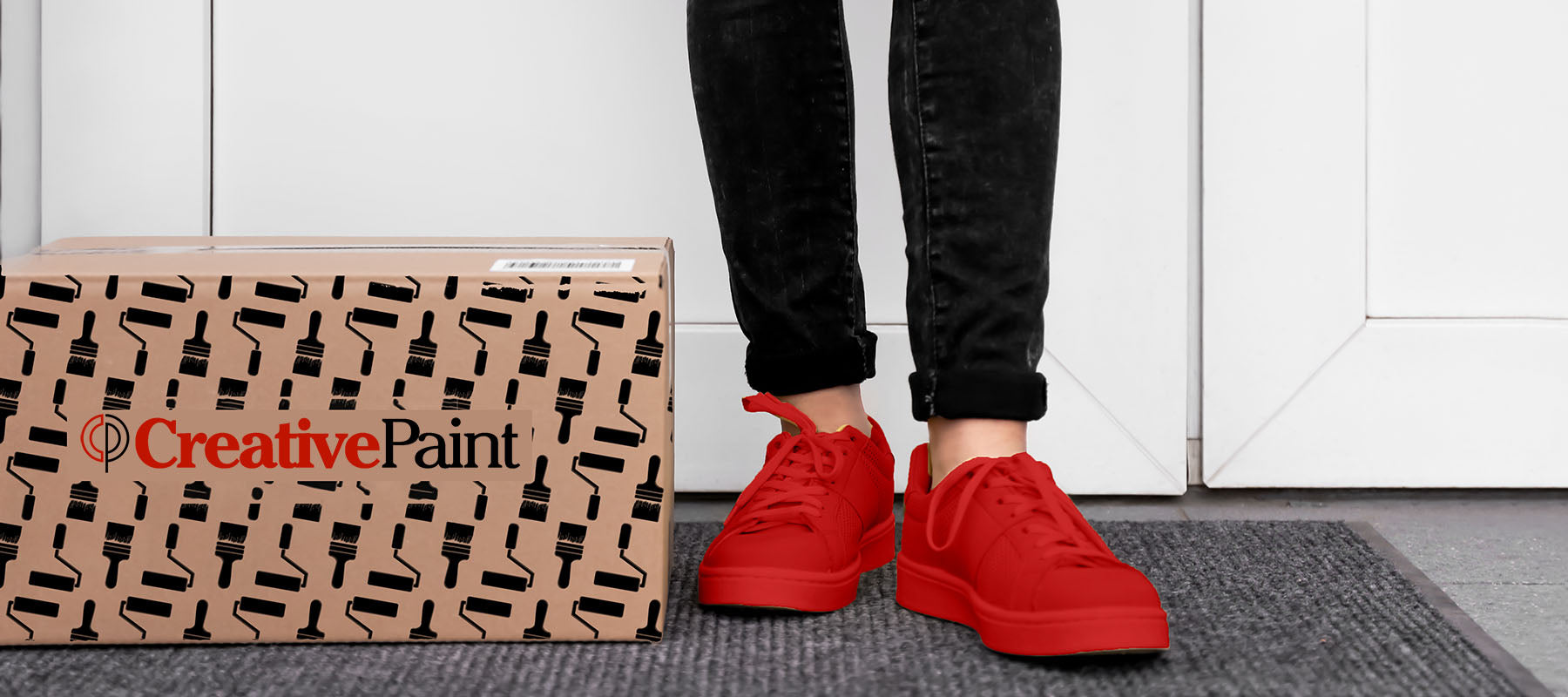 brown cardboard box with Creative Paint logo, sitting on front door step next to woman's red shoes. image showing a paint delivery to residential home in San Fransisco